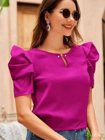 Blusa feminina elegante e glamurosa, perfeita para ocasiões especiais e eventos sofisticados.